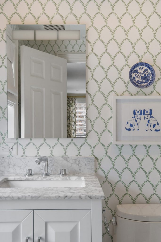 white bathroom with marble countertops