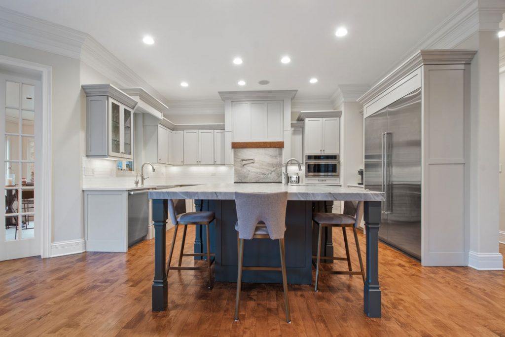 kitchen renovation- all new off white cabinets, large island for sink and counter tops with bar seating